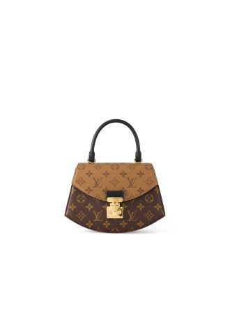 #M46548 Louis Vuitton Monogram Reverse Canvas Tilsitt Handbag