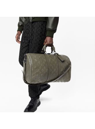 #M57963 Louis Vuitton Monogram Seal Keepall Bandouliere 50